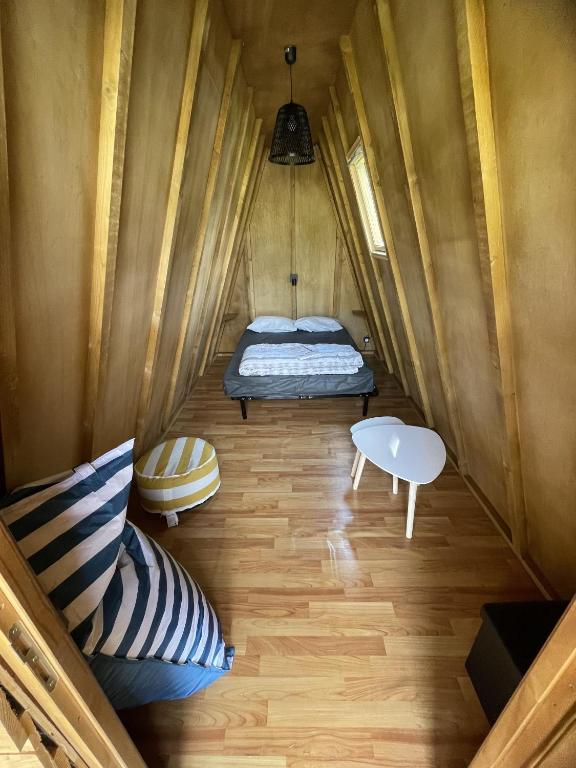 Postel nebo postele na pokoji v ubytování Camping Paradis du Quinquis
