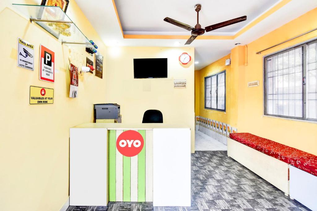 Un televizor și/sau centru de divertisment la Hotel O Cooum Riverview Chennai Formerly Nimalan Residency