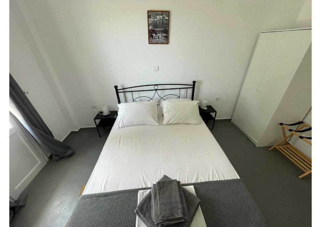 Postel nebo postele na pokoji v ubytování Spanos Apartments - Panteli