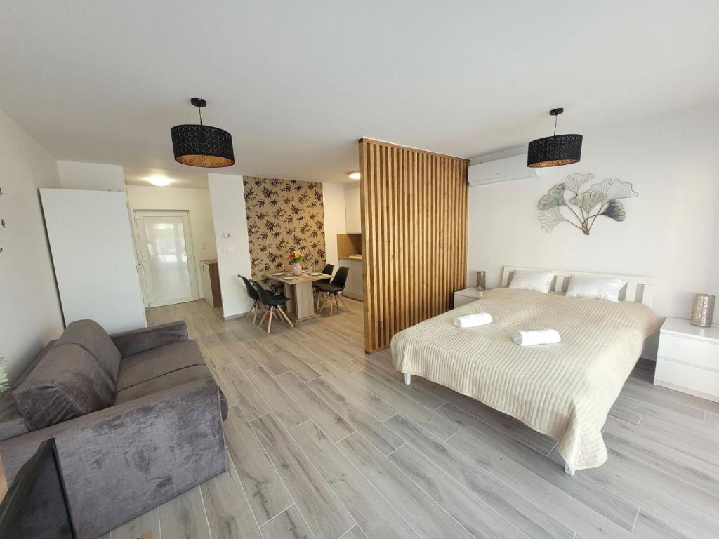 Posezení v ubytování Aura Residence Apartman