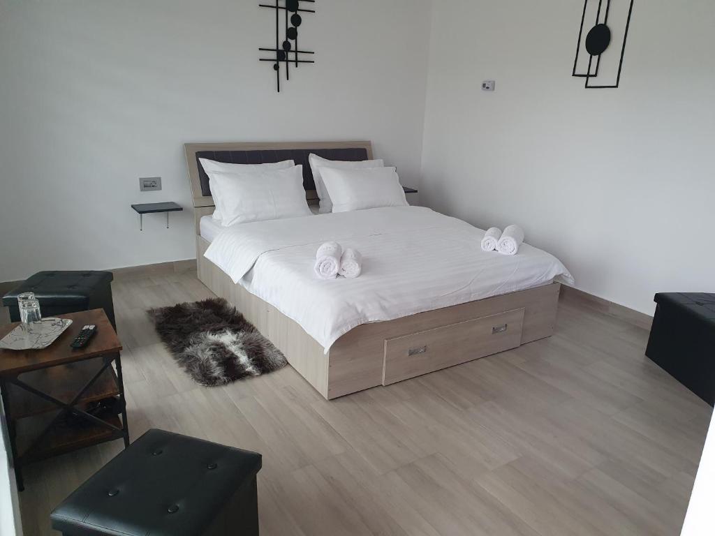 Postel nebo postele na pokoji v ubytování LiAn House
