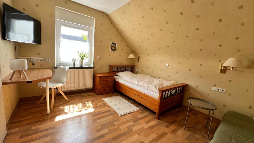 Postel nebo postele na pokoji v ubytování Gästehaus Kliebenstein
