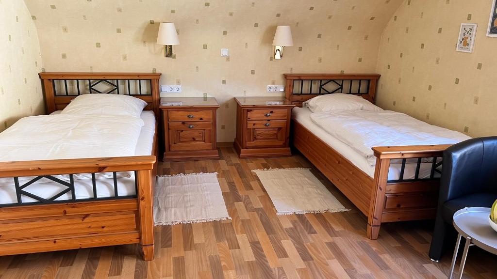 Postel nebo postele na pokoji v ubytování Gästehaus Kliebenstein