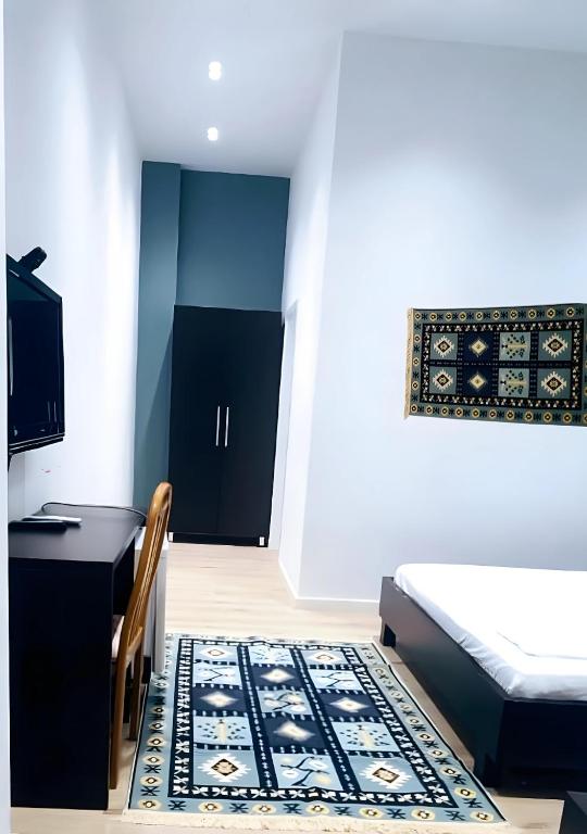 Postel nebo postele na pokoji v ubytování VILA LILI Guest House - Berat
