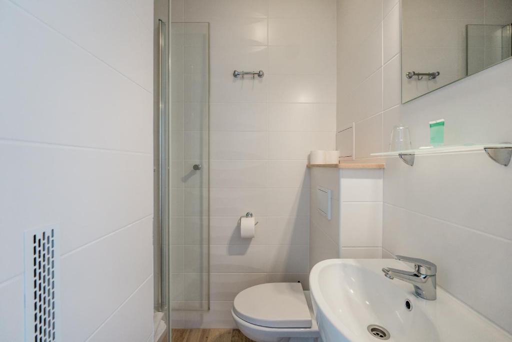 Kúpeľňa v ubytovaní Hotel Wodnik