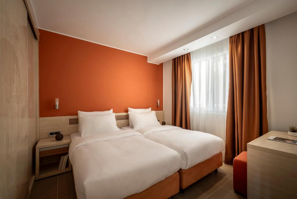 Postel nebo postele na pokoji v ubytování Maistra Select Belvedere Resort