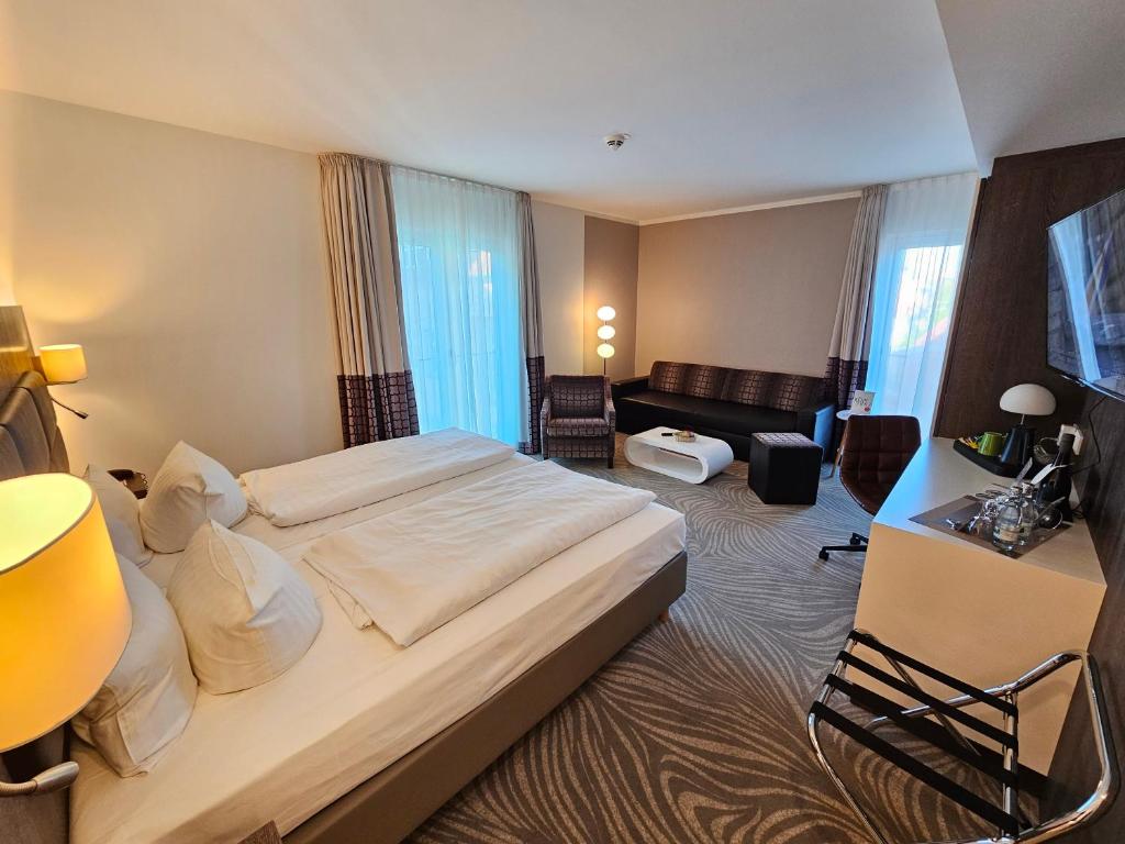 Voodi või voodid majutusasutuse Hotel Am Kaisersaal toas