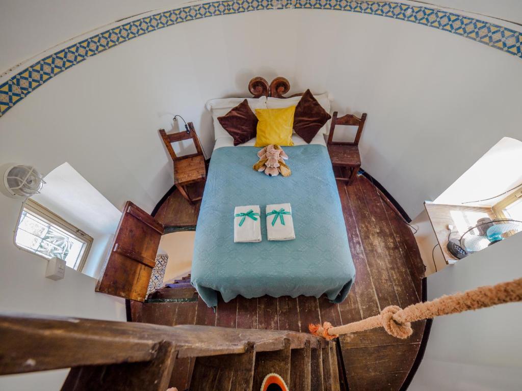 A bed or beds in a room at Muin a Ventu Historical Tower
