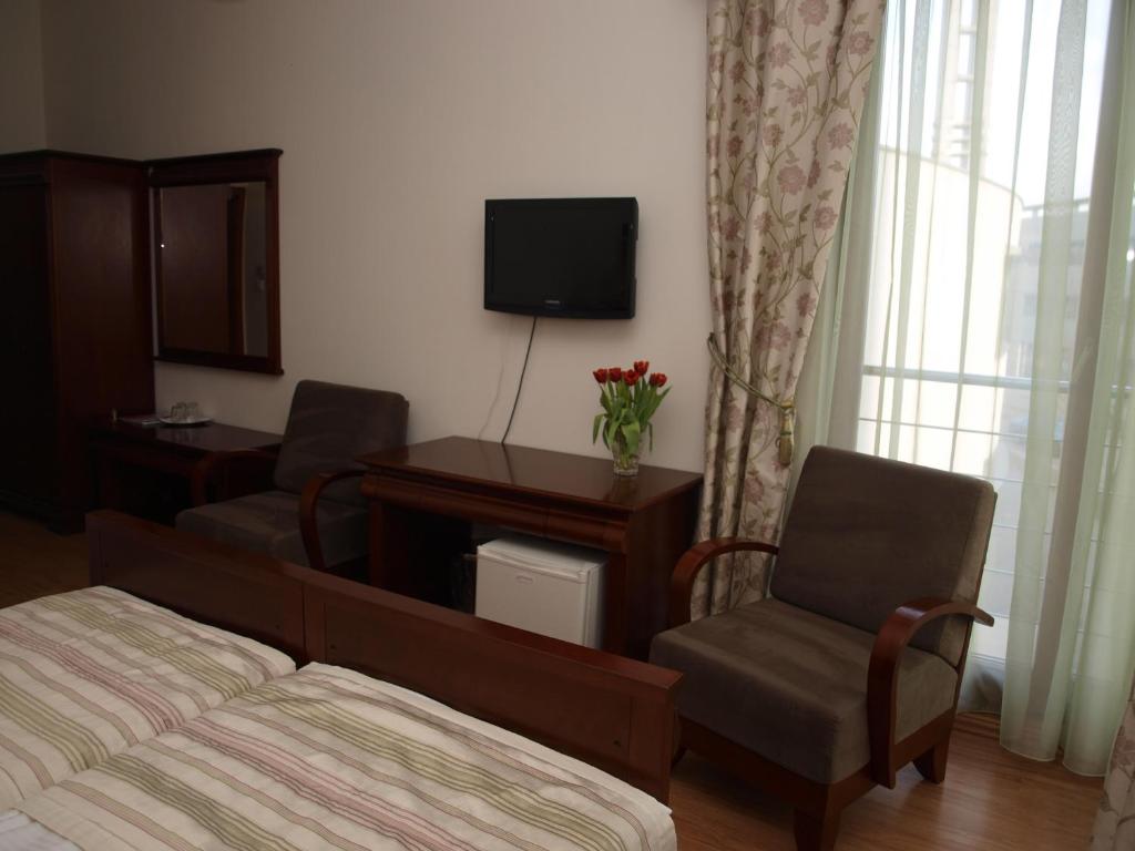 TV a/nebo společenská místnost v ubytování Hotel Oko