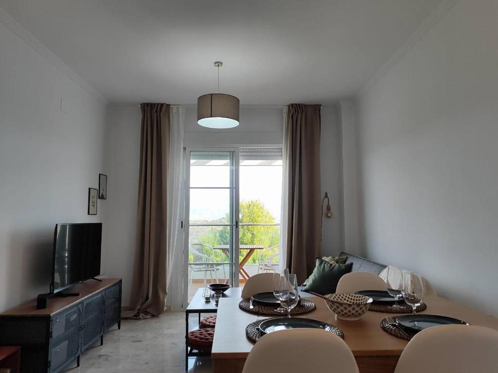 TV a/nebo společenská místnost v ubytování Apartamento Happy Days