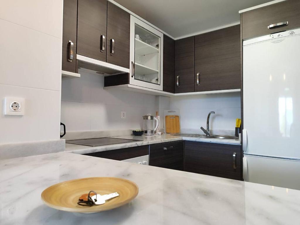 Kuchyň nebo kuchyňský kout v ubytování Apartamento Happy Days
