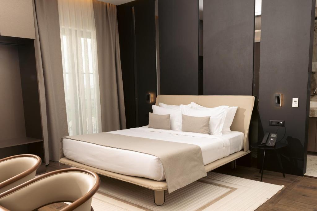 Postel nebo postele na pokoji v ubytování Venus Hotel