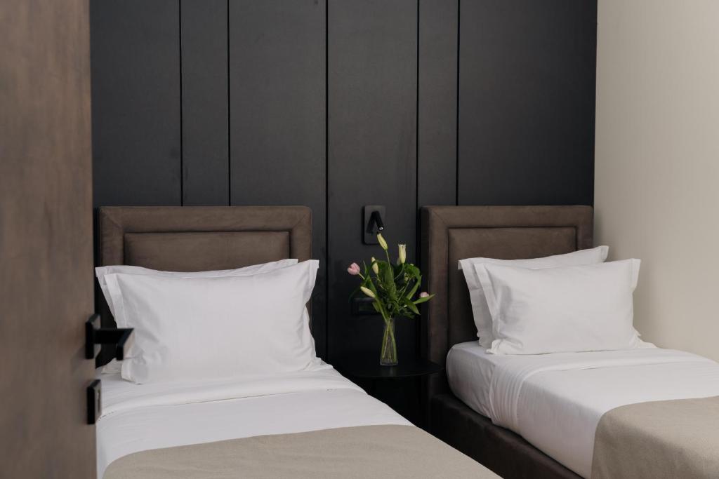Postel nebo postele na pokoji v ubytování Venus Hotel
