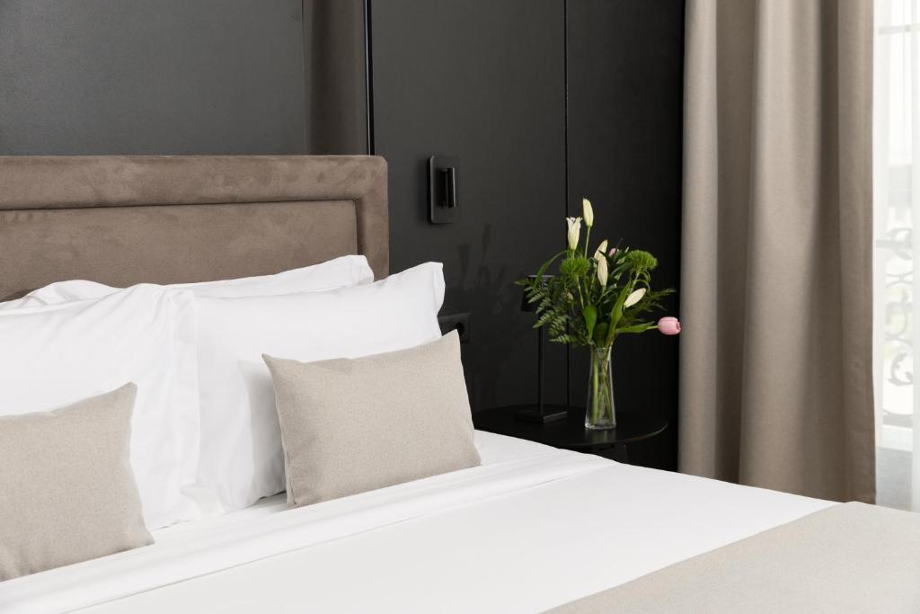 Postel nebo postele na pokoji v ubytování Venus Hotel