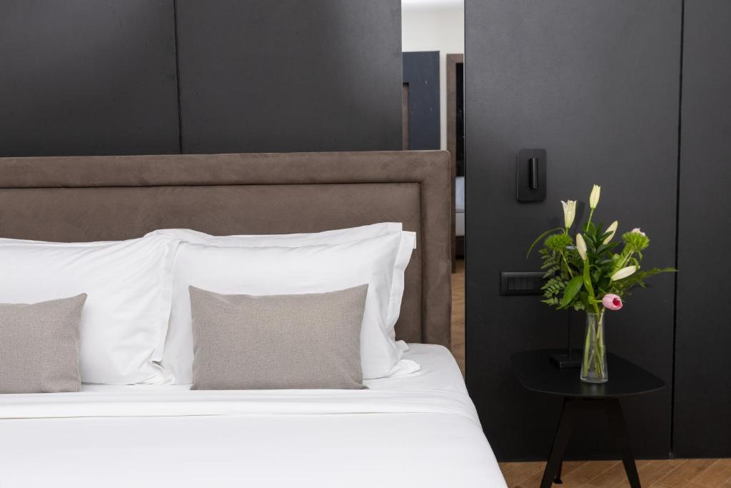 Postel nebo postele na pokoji v ubytování Venus Hotel