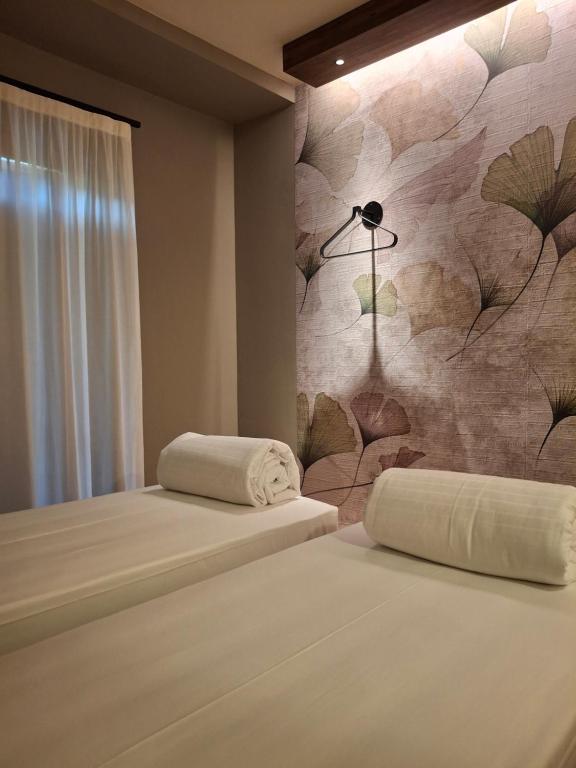 Postel nebo postele na pokoji v ubytování Hotel Dolomiti Saone