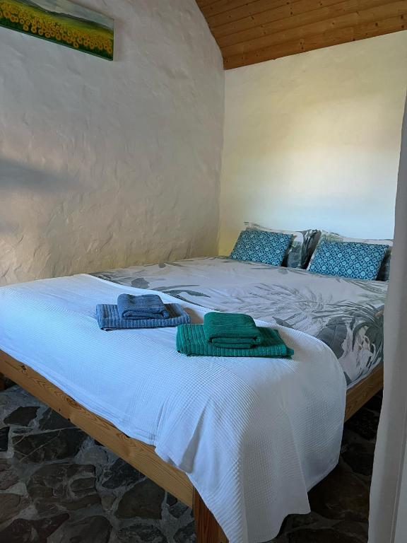 Postel nebo postele na pokoji v ubytování Finca Esmeralda