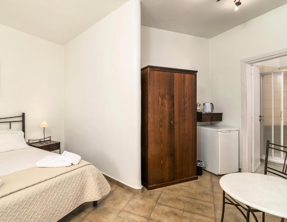 A bed or beds in a room at Livanios Studios