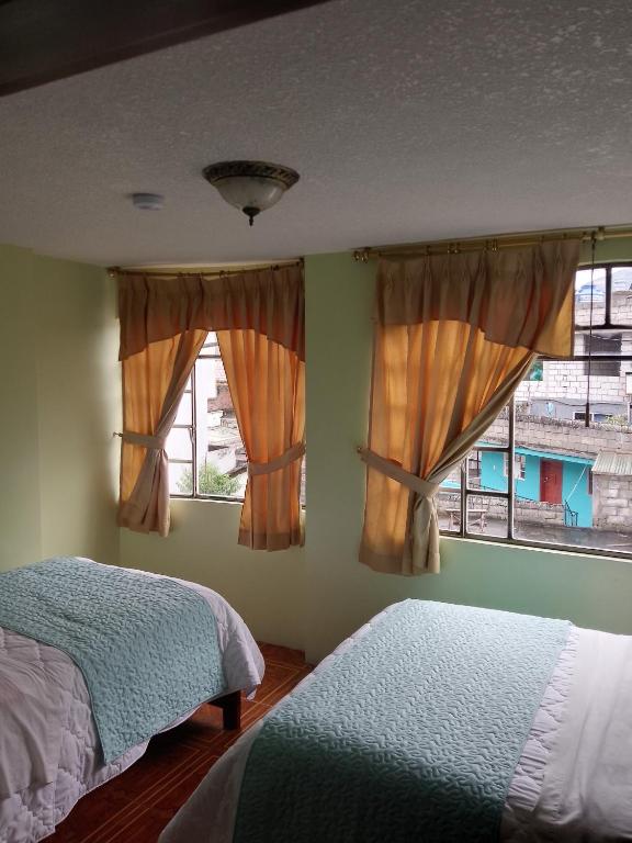 Postel nebo postele na pokoji v ubytování Hotel Amazonia y sol