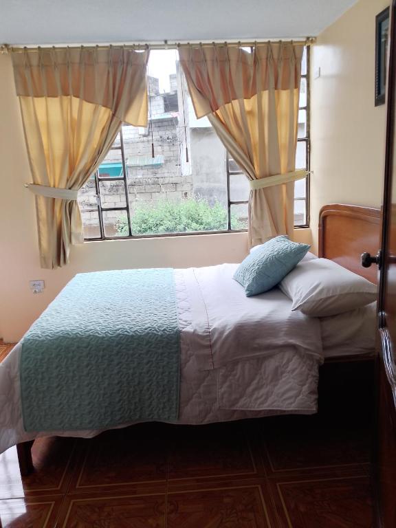 Postel nebo postele na pokoji v ubytování Hotel Amazonia y sol