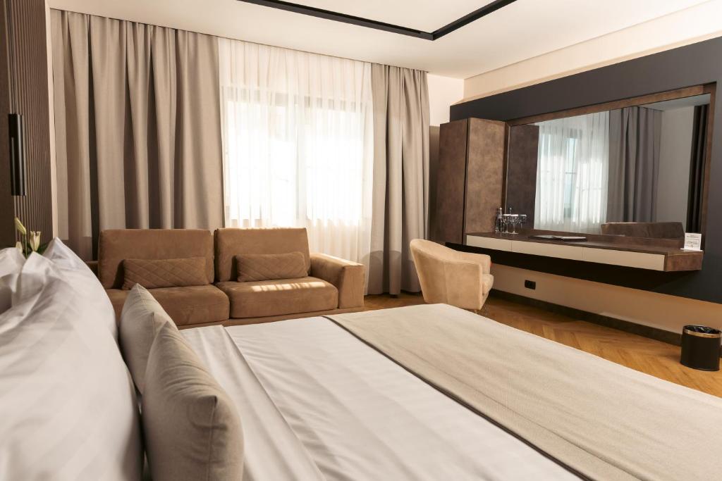 Postel nebo postele na pokoji v ubytování Venus Hotel