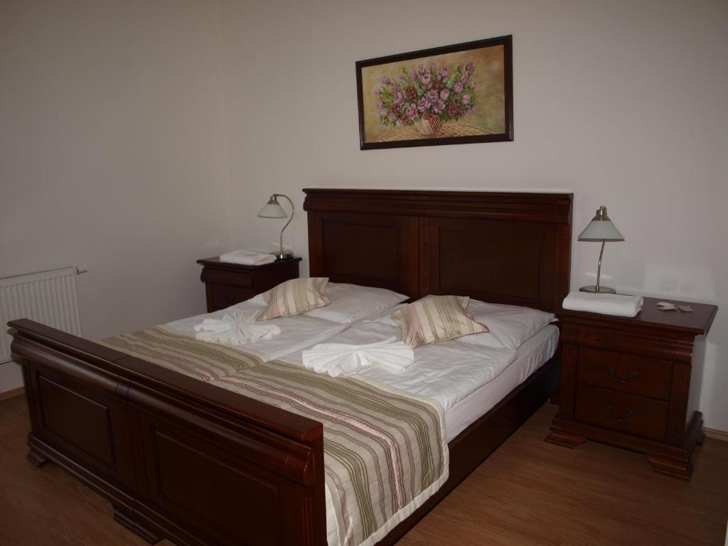 Postel nebo postele na pokoji v ubytování Hotel Oko