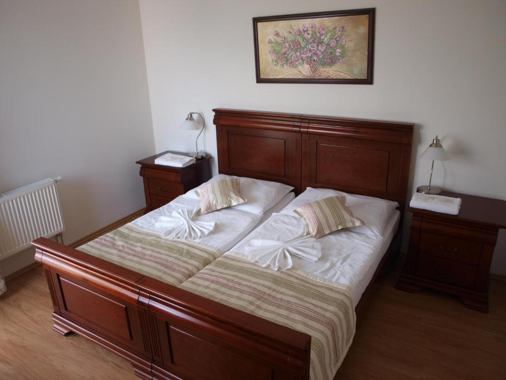 Postel nebo postele na pokoji v ubytování Hotel Oko