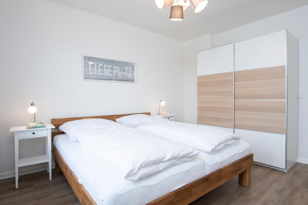 Postel nebo postele na pokoji v ubytování Skippers Hus Liegeplatz