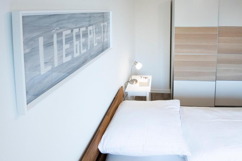 Postel nebo postele na pokoji v ubytování Skippers Hus Liegeplatz