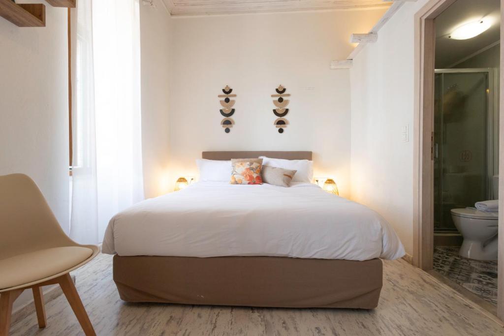 Posteľ alebo postele v izbe v ubytovaní Sophia Areopoli Guesthouse