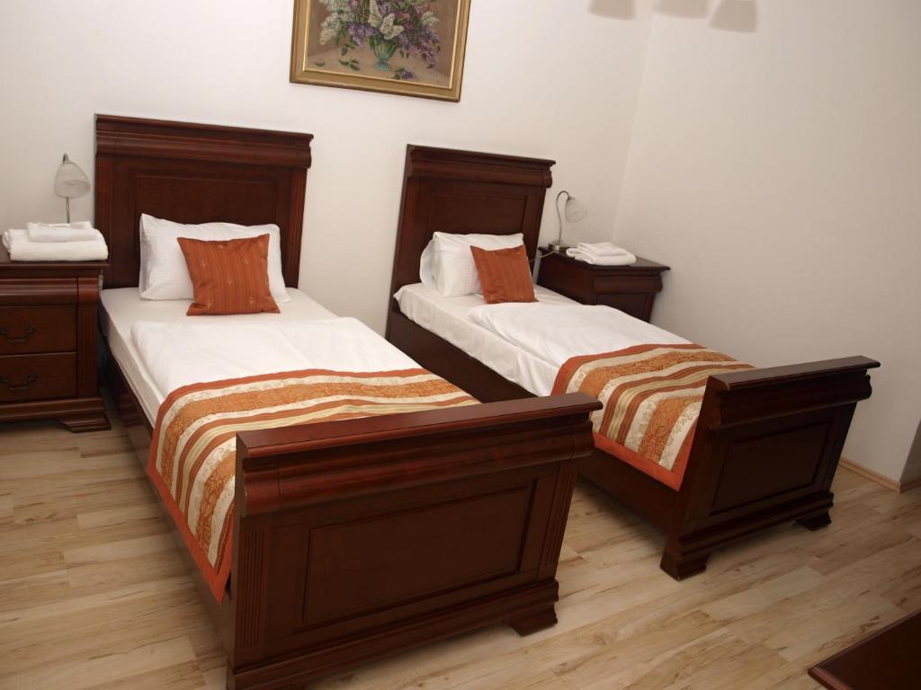 Postel nebo postele na pokoji v ubytování Hotel Oko