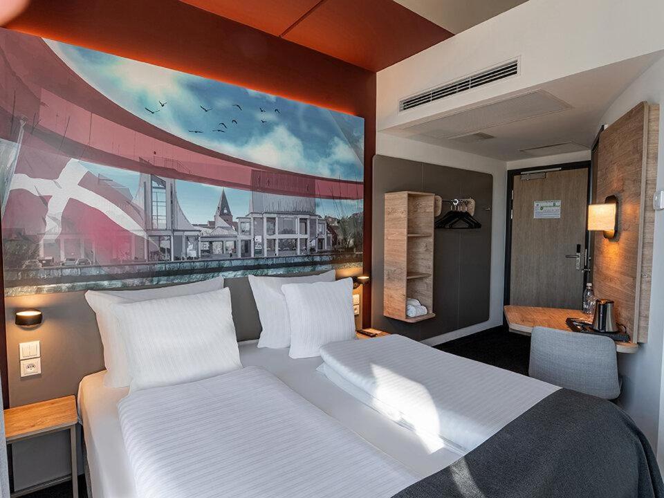 Postel nebo postele na pokoji v ubytování B&B HOTEL Aalborg