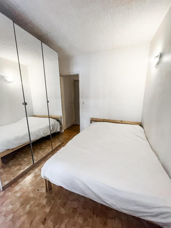 Postel nebo postele na pokoji v ubytování Nice stay near to Paris