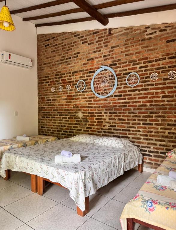 Postel nebo postele na pokoji v ubytování Pousada Arraial dos Sonhos