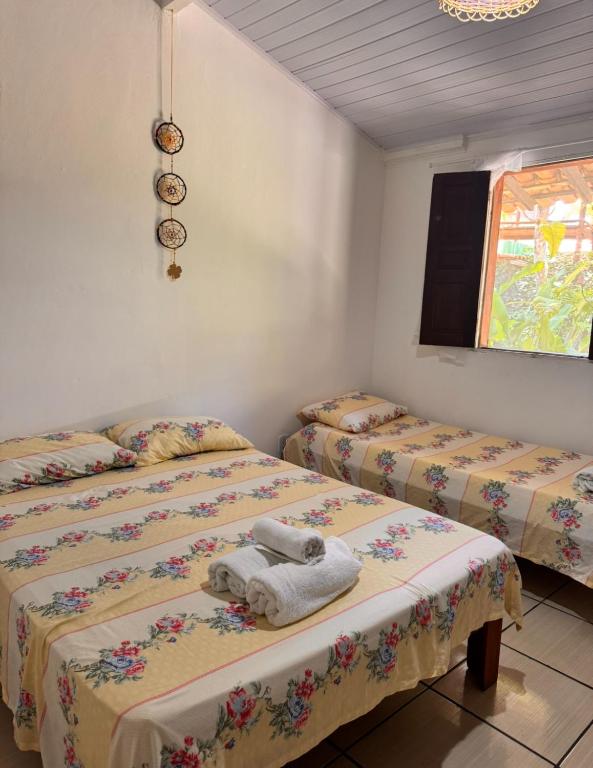 Postel nebo postele na pokoji v ubytování Pousada Arraial dos Sonhos