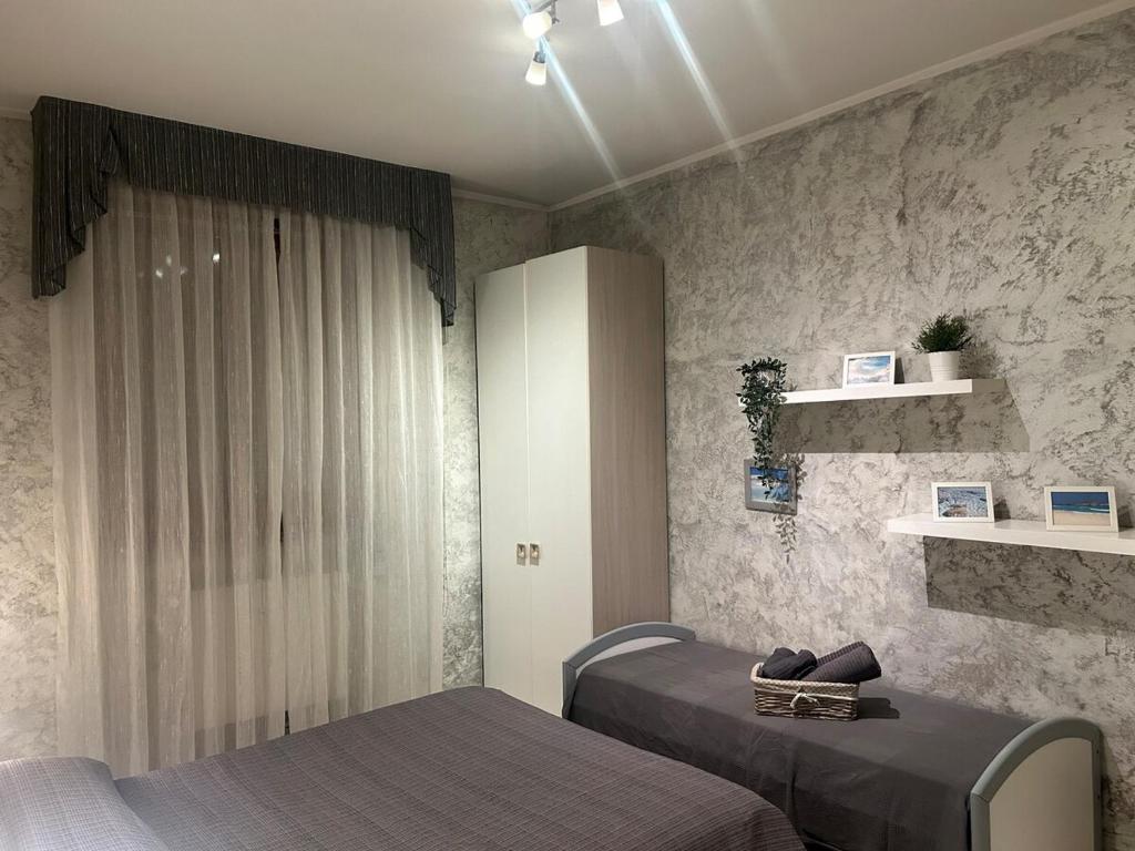 Postel nebo postele na pokoji v ubytování CASA DI MANU e DADO