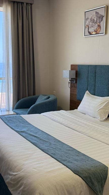 Postel nebo postele na pokoji v ubytování SEAVIEW HOTEL