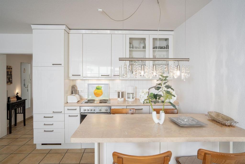 Kuchyň nebo kuchyňský kout v ubytování Strand Domizil Wohnung 2