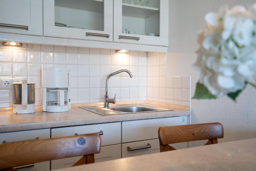 Kuchyň nebo kuchyňský kout v ubytování Strand Domizil Wohnung 2