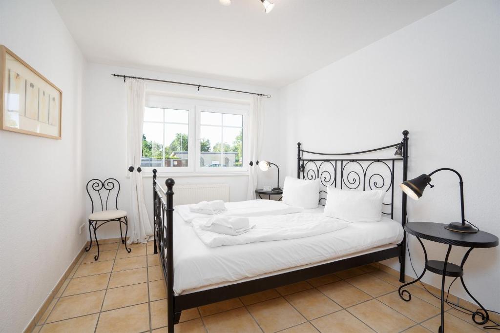 Postel nebo postele na pokoji v ubytování Strand Domizil Wohnung 2