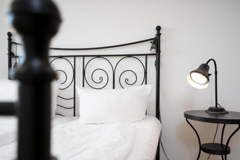 Postel nebo postele na pokoji v ubytování Strand Domizil Wohnung 2