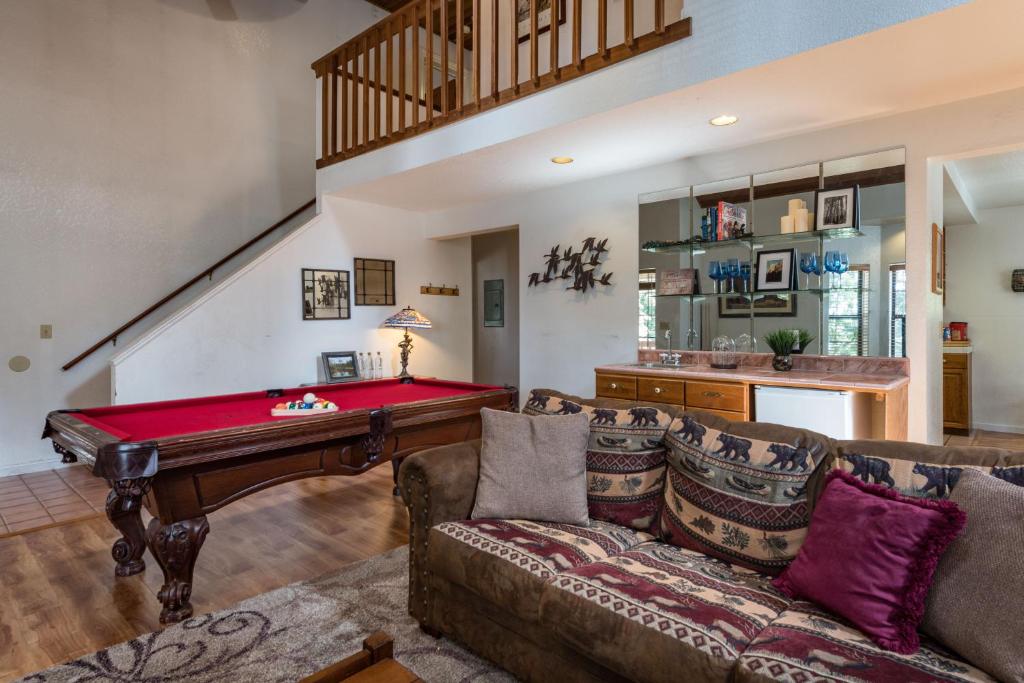 a living room with a pool table at Inside Yosemite Mountain Beauty in Yosemite West