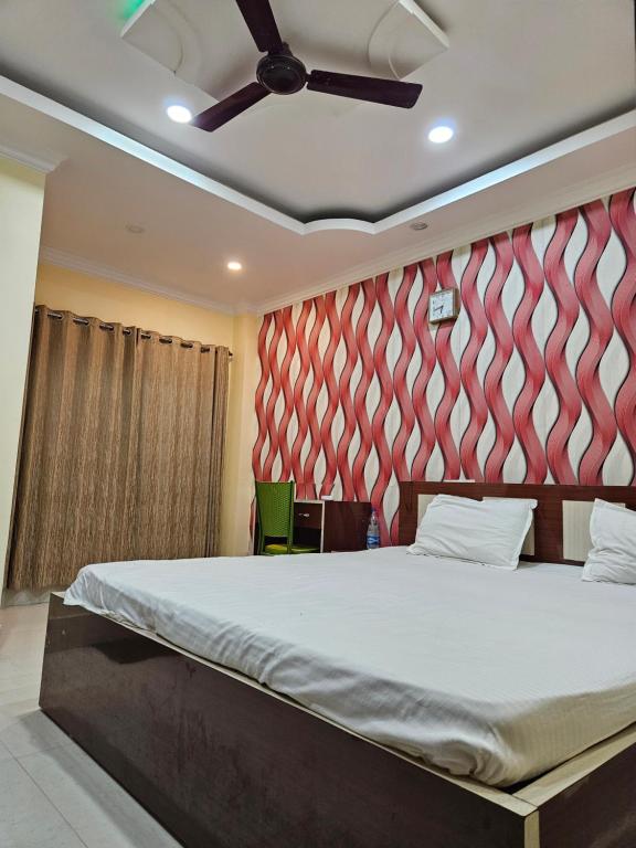 Postel nebo postele na pokoji v ubytování Hotel Royal Sunview