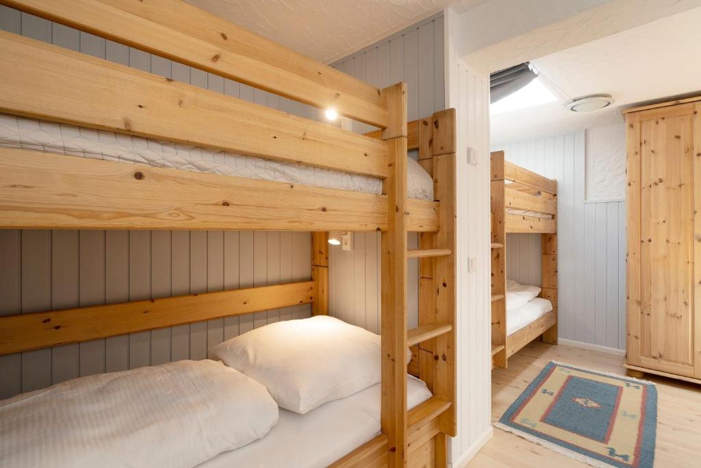 Postel nebo postele na pokoji v ubytování Dünenbungalow
