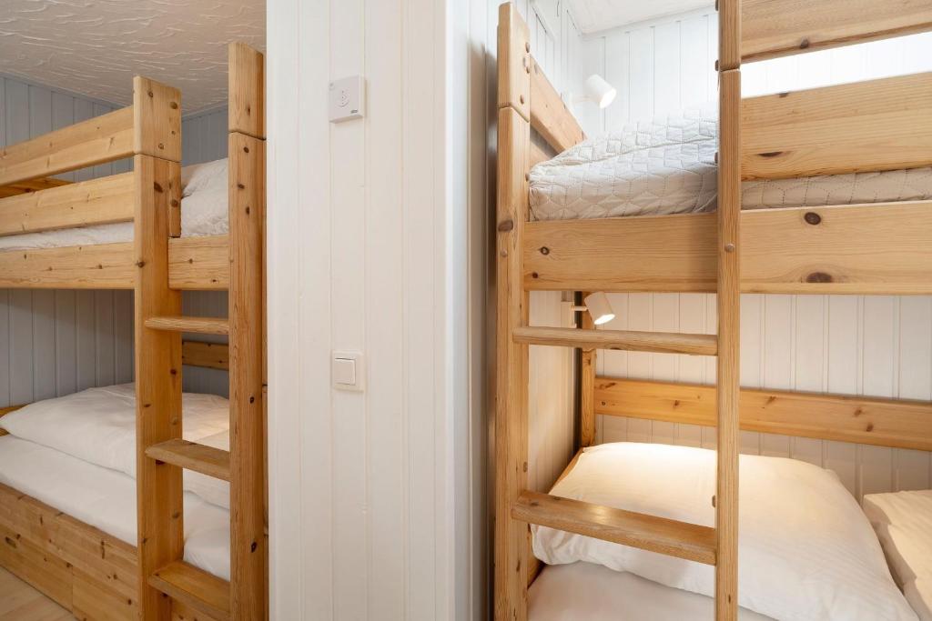 Postel nebo postele na pokoji v ubytování Dünenbungalow