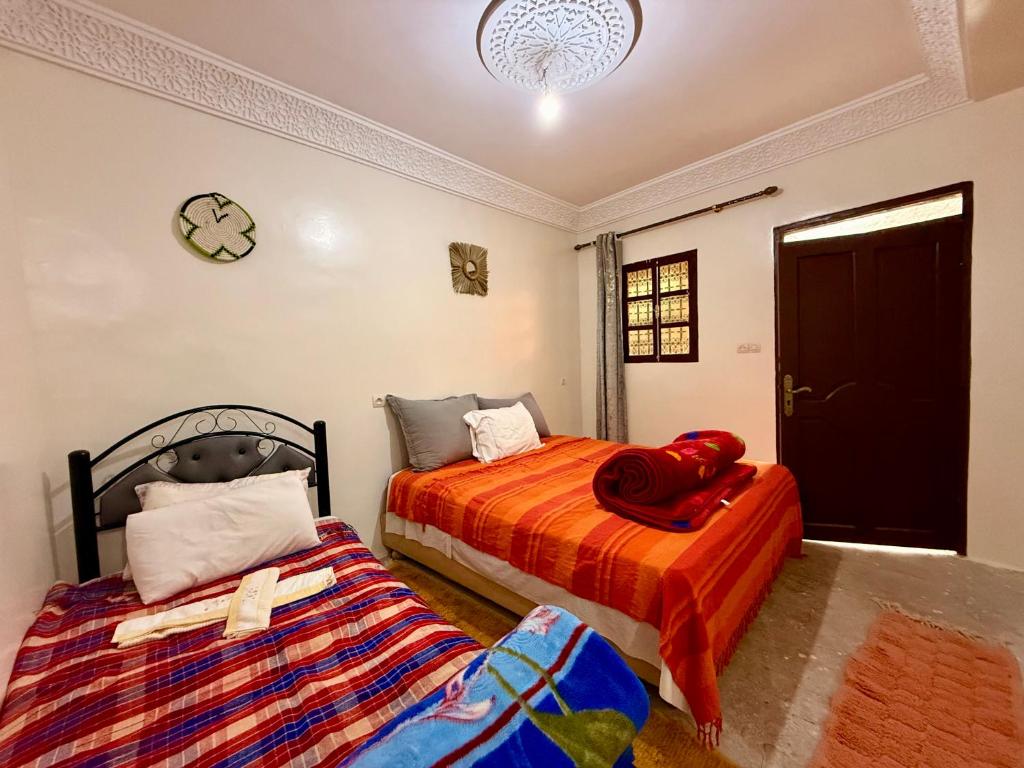 Postel nebo postele na pokoji v ubytování Saida Berber House