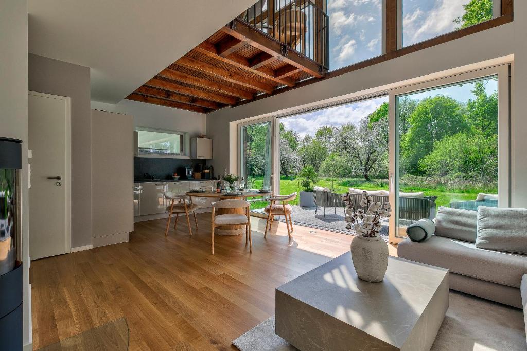 a living room with a couch and a table at Apartment Rehwiese in Burg