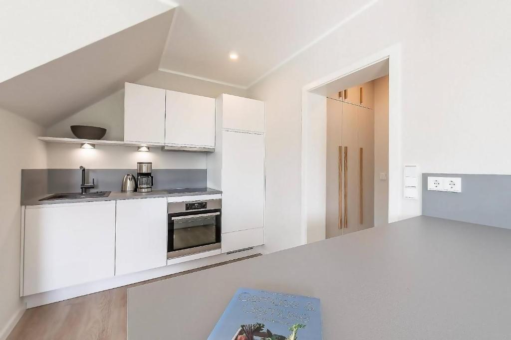 Kuchyň nebo kuchyňský kout v ubytování Sonne und Meer Wohnung 2