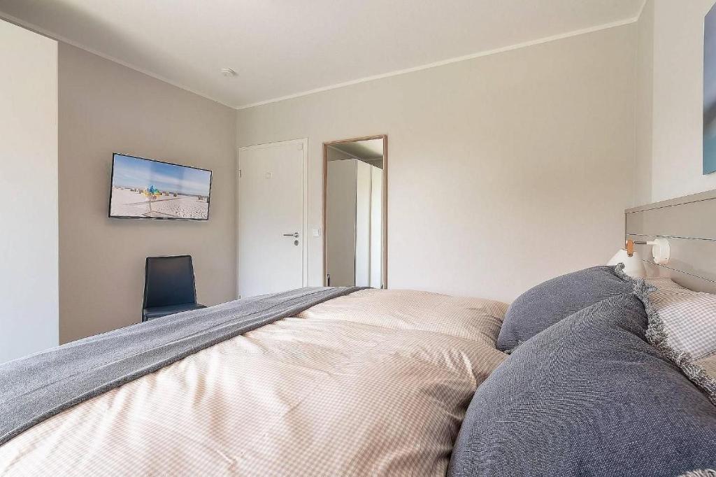 Postel nebo postele na pokoji v ubytování Sonne und Meer Wohnung 2
