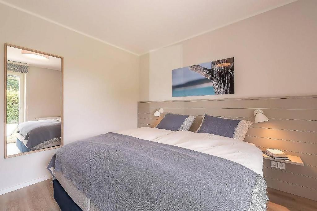 Postel nebo postele na pokoji v ubytování Sonne und Meer Wohnung 2